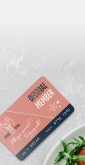 Custom printed membership card laying on a desk